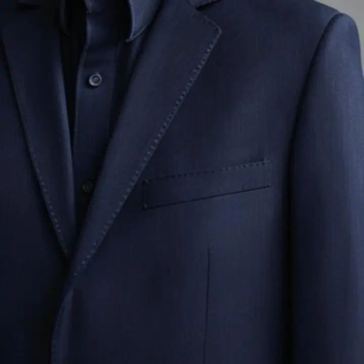 Közeli, nagyfelbontású fotó férfi ruhadarab textúrájáról